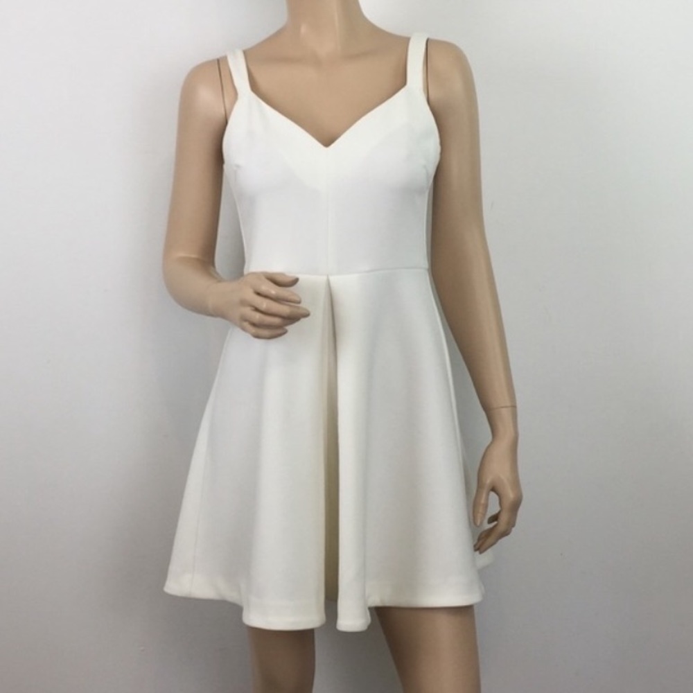 Fit and flare skater style white dress.